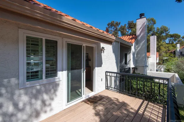 a swimming pool with outdoor seating and yard
