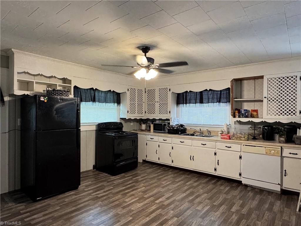 231 Becks Church Road Lexington, NC 27292 - Photo 3 of 14 Large kitchen. Black Stove and Fridge are included.