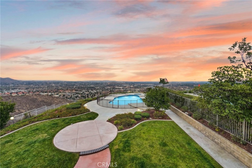 16318 Sun Summit Drive Riverside, CA 92503 - Photo 4 of 47 BackYard from balcony16318 sun summit drive, riverside, california 92503 (AI Twilight Edit)