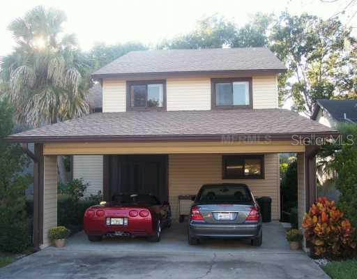 3577 Raintree Lane Lakeland, FL 33803 - Photo 1 of 1 a car parked in front of a house