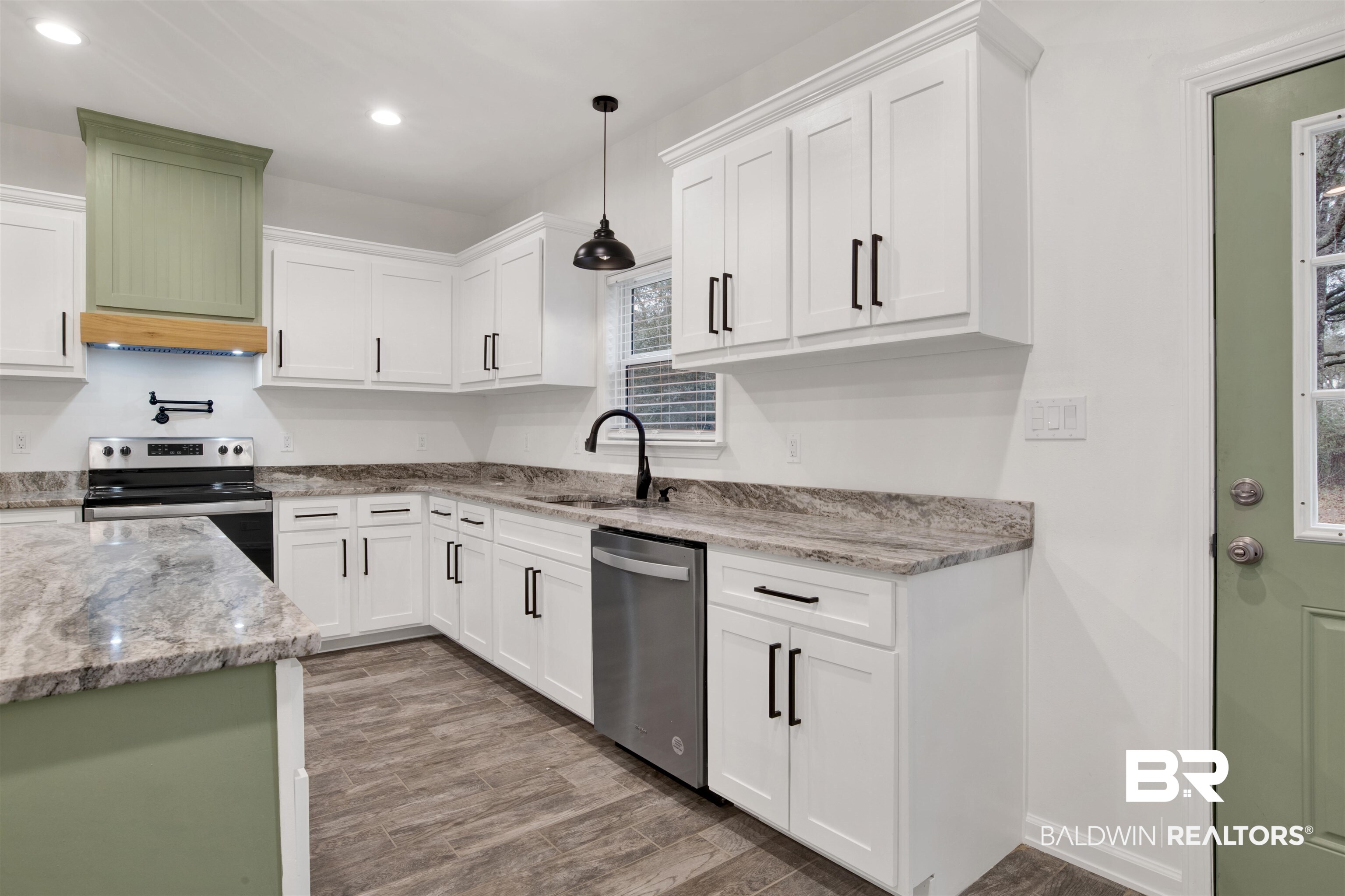 10871 Somerset Road Grand Bay, AL 36541 - Photo 14 of 31 Kitchen with white cabinetry, stainless steel appliances, and sink