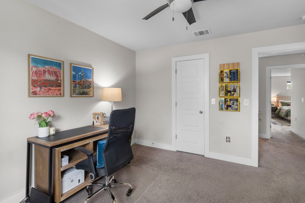 610 Bernstein Street, Unit 14 Austin, TX 78745 - Photo 27 of 39 Carpeted office featuring ceiling fan and baseboards