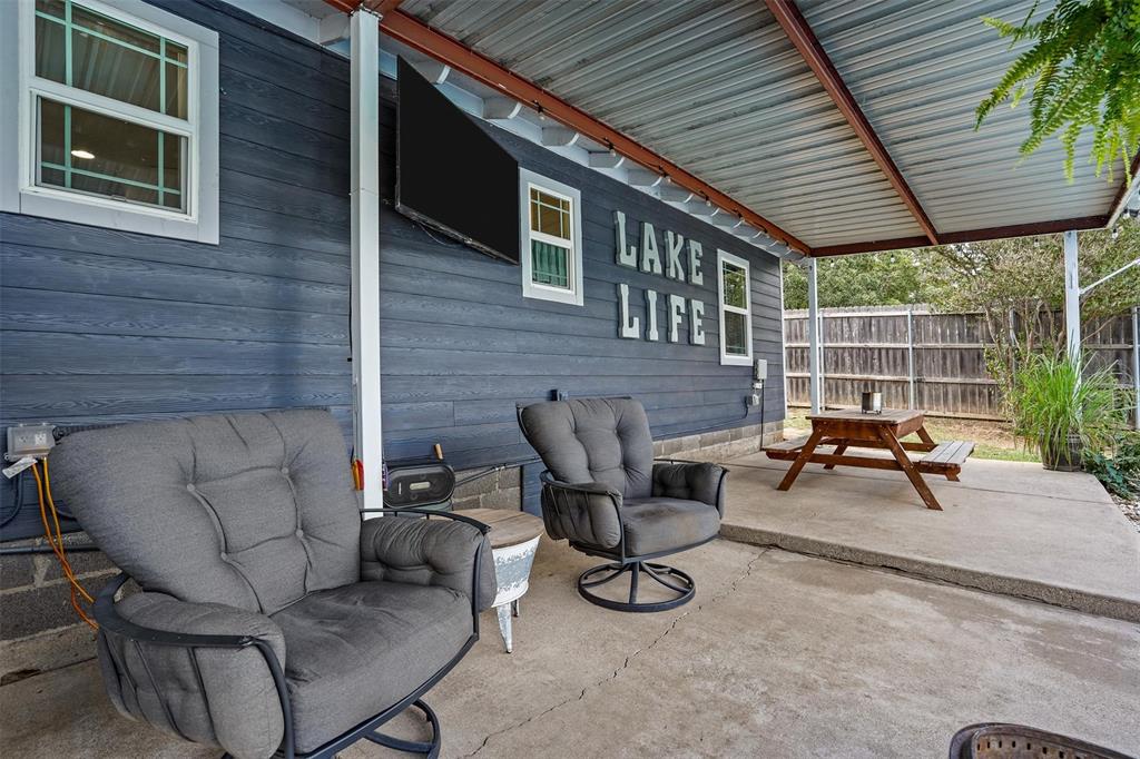 7130 Briar Road Azle, TX 76020 - Photo 22 of 37 a view of a patio with couches and a barbeque