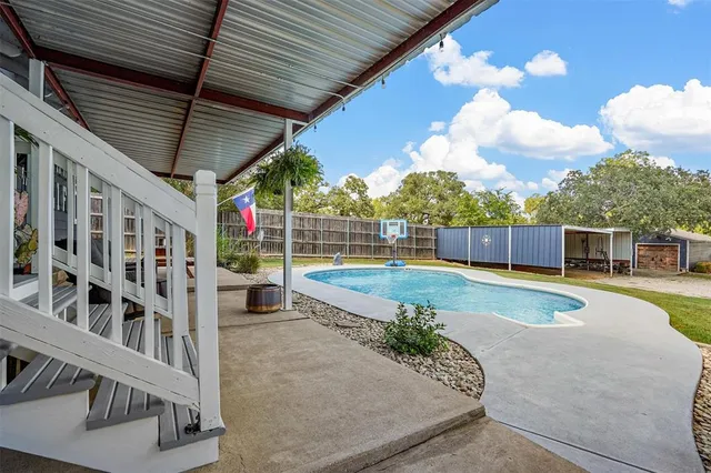a view of a trees with a yard