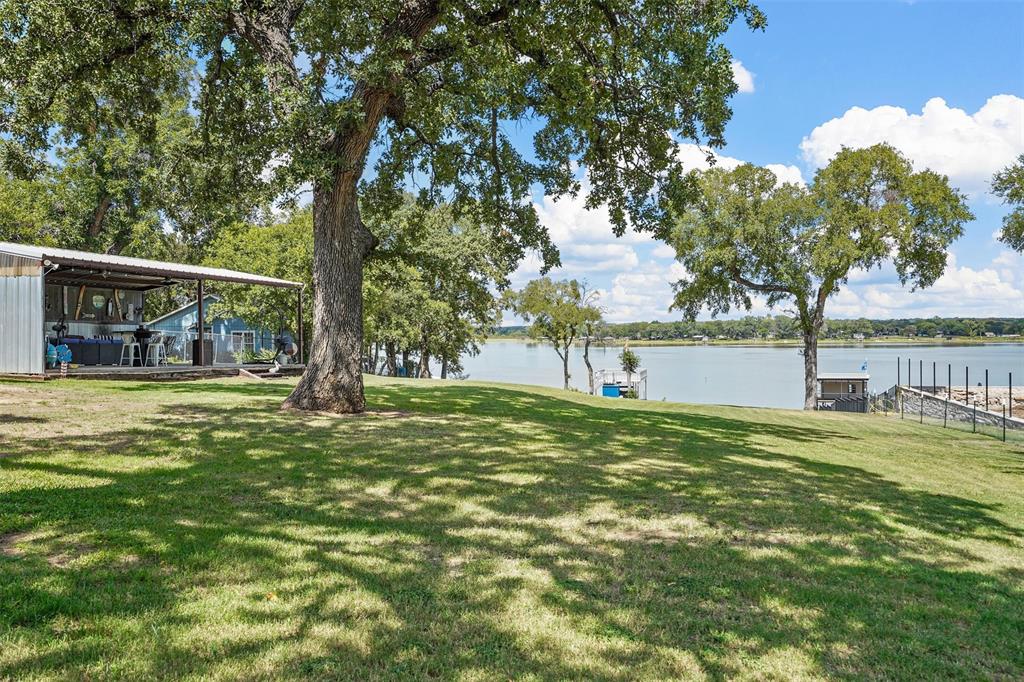 7130 Briar Road Azle, TX 76020 - Photo 24 of 37 a view of a trees with a yard