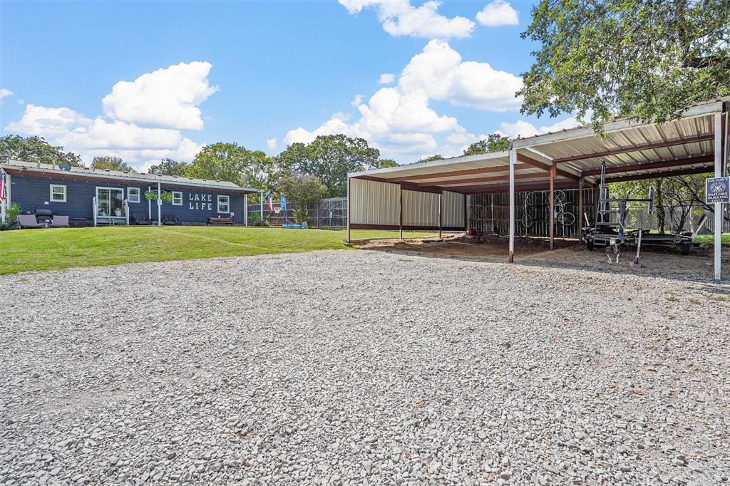 7130 Briar Road Azle, TX 76020 - Photo 25 of 37 a view of a house with a yard and sitting area
