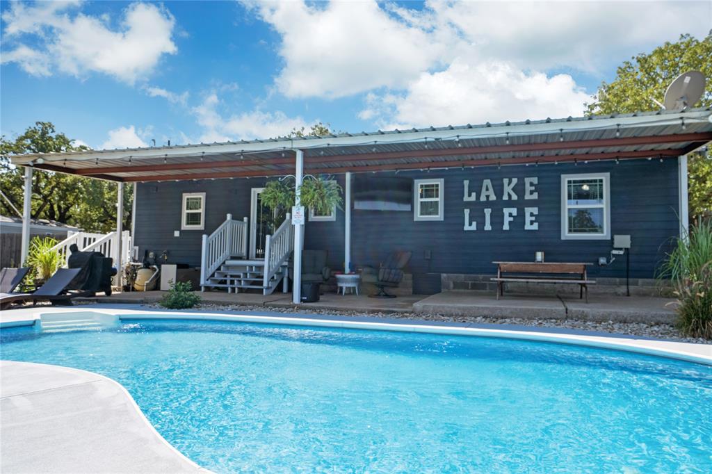 7130 Briar Road Azle, TX 76020 - Photo 5 of 37 a view of a house with patio