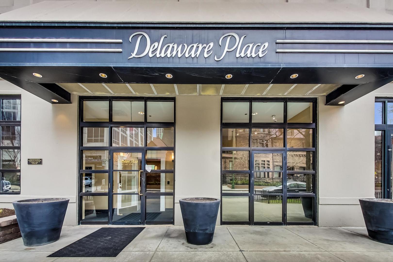 33 West Delaware Place, Unit 13A Chicago, IL 60610 - Photo 4 of 32 a view of a door and an outdoor space