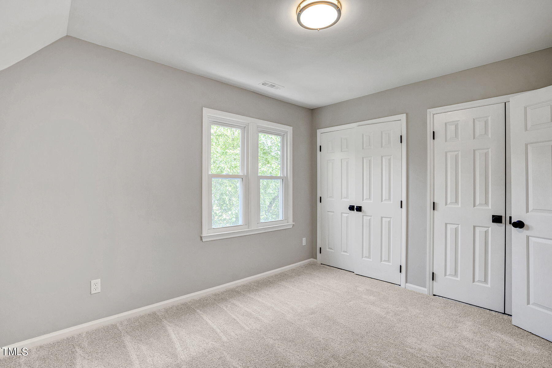 1248 Hillingdon Way Raleigh, NC 27614 - Photo 25 of 32 a view of an empty room with a window