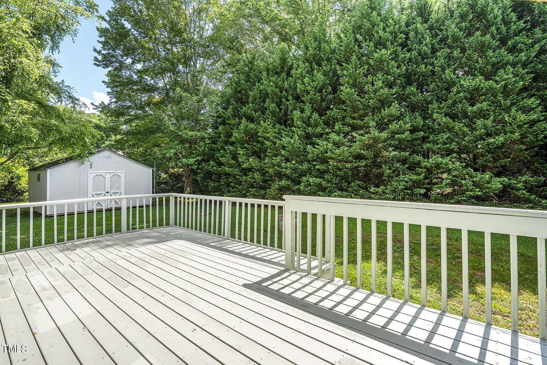 1248 Hillingdon Way Raleigh, NC 27614 - Photo 26 of 32 a view of a wooden roof deck