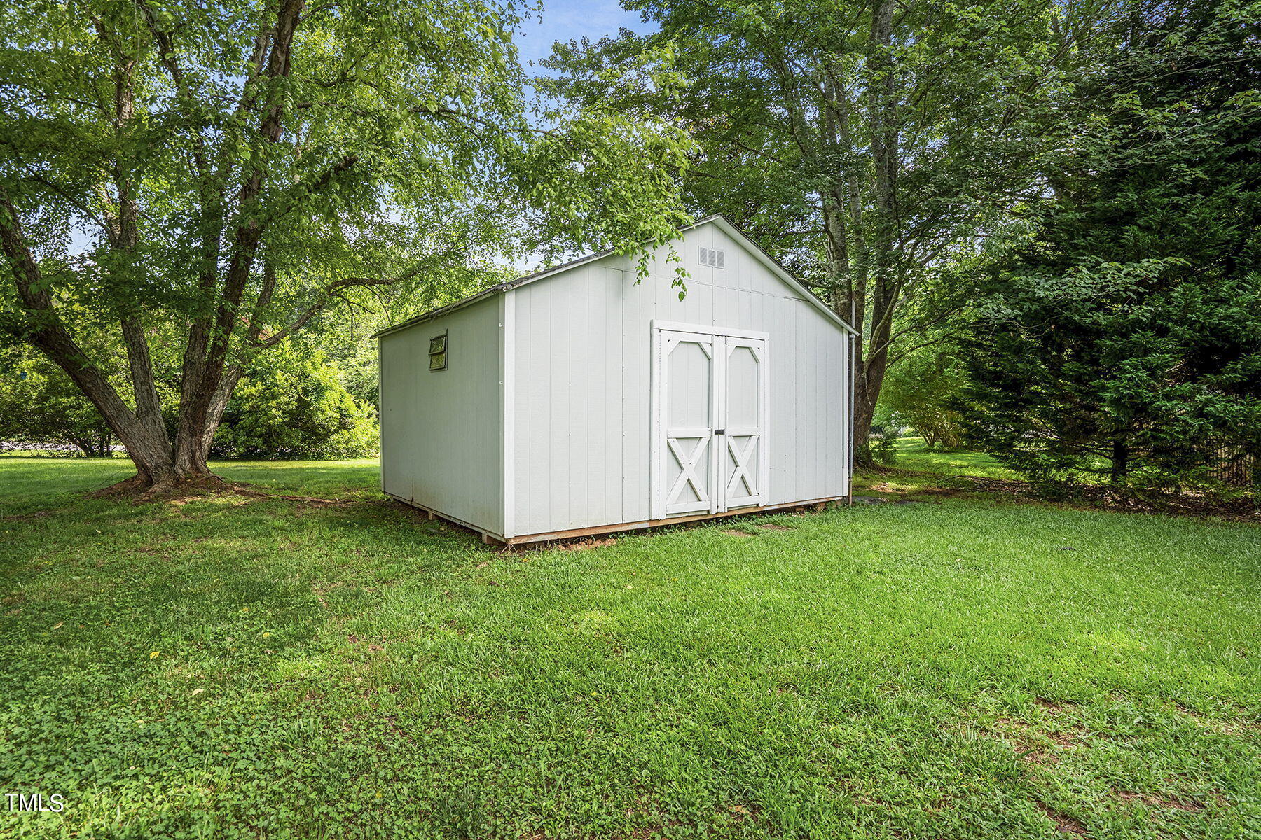1248 Hillingdon Way Raleigh, NC 27614 - Photo 27 of 32 a view of backyard of house with green space