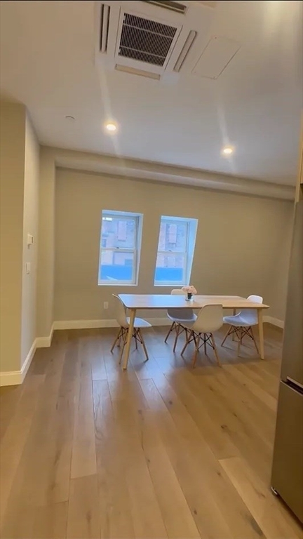 44-46 Temple Place, Unit 3 Boston, MA 02111 - Photo 6 of 11 a view of a room with gym equipment