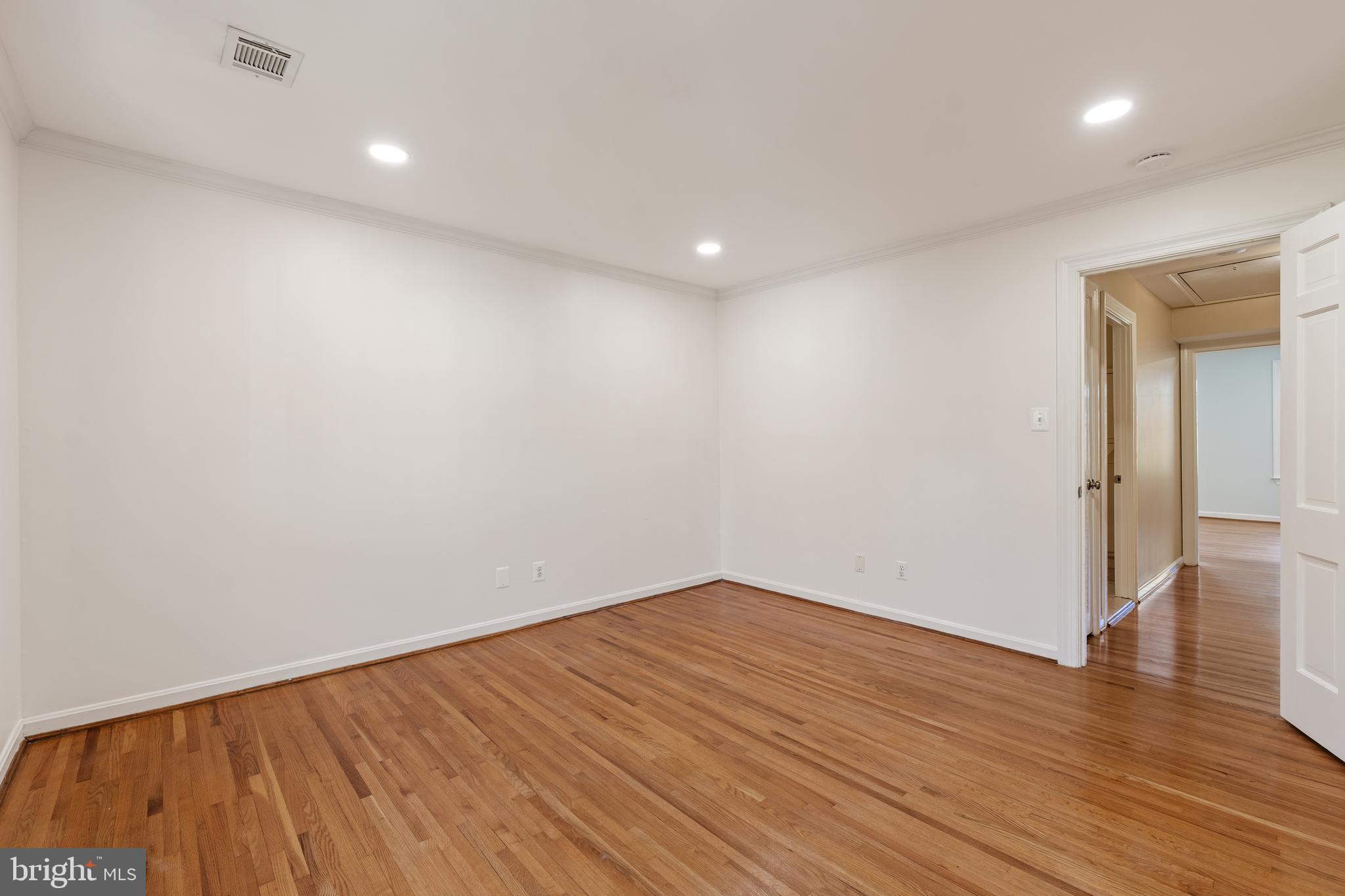 706 6th Street Southwest Washington, DC 20024 - Photo 17 of 39 a view of empty room with wooden floor