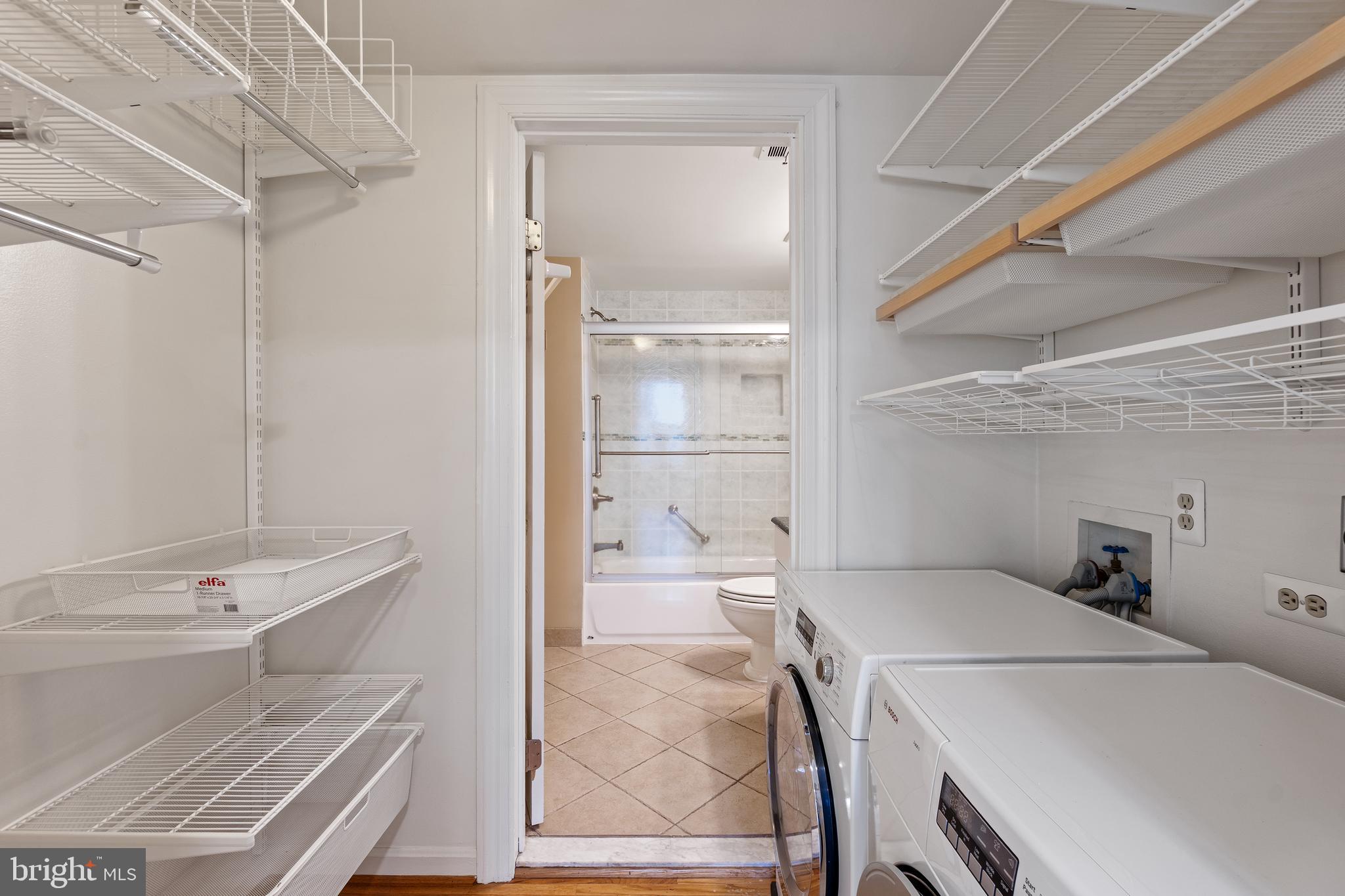 706 6th Street Southwest Washington, DC 20024 - Photo 24 of 39 a bathroom with a sink a toilet and shower