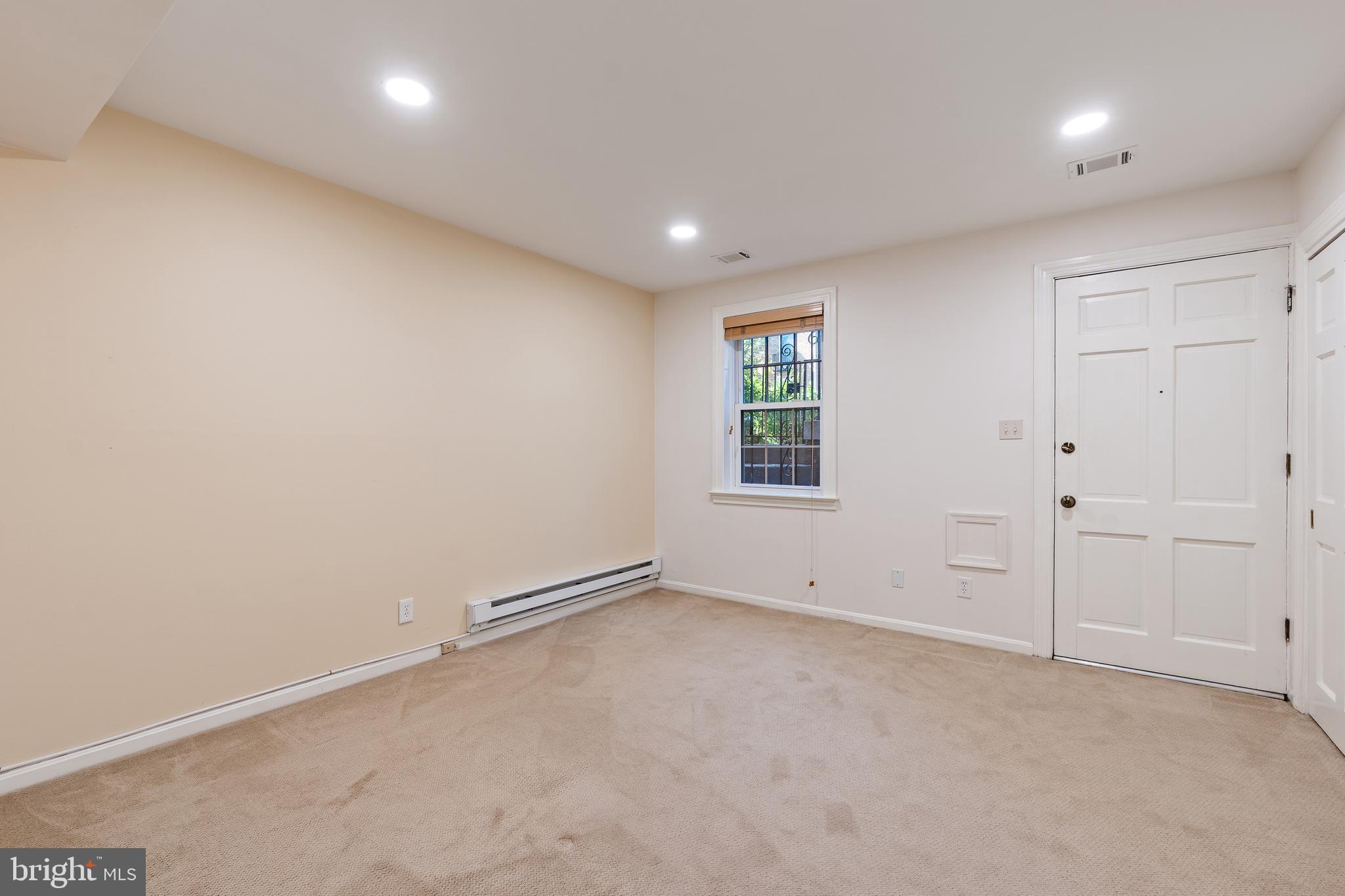 706 6th Street Southwest Washington, DC 20024 - Photo 26 of 39 an empty room with windows