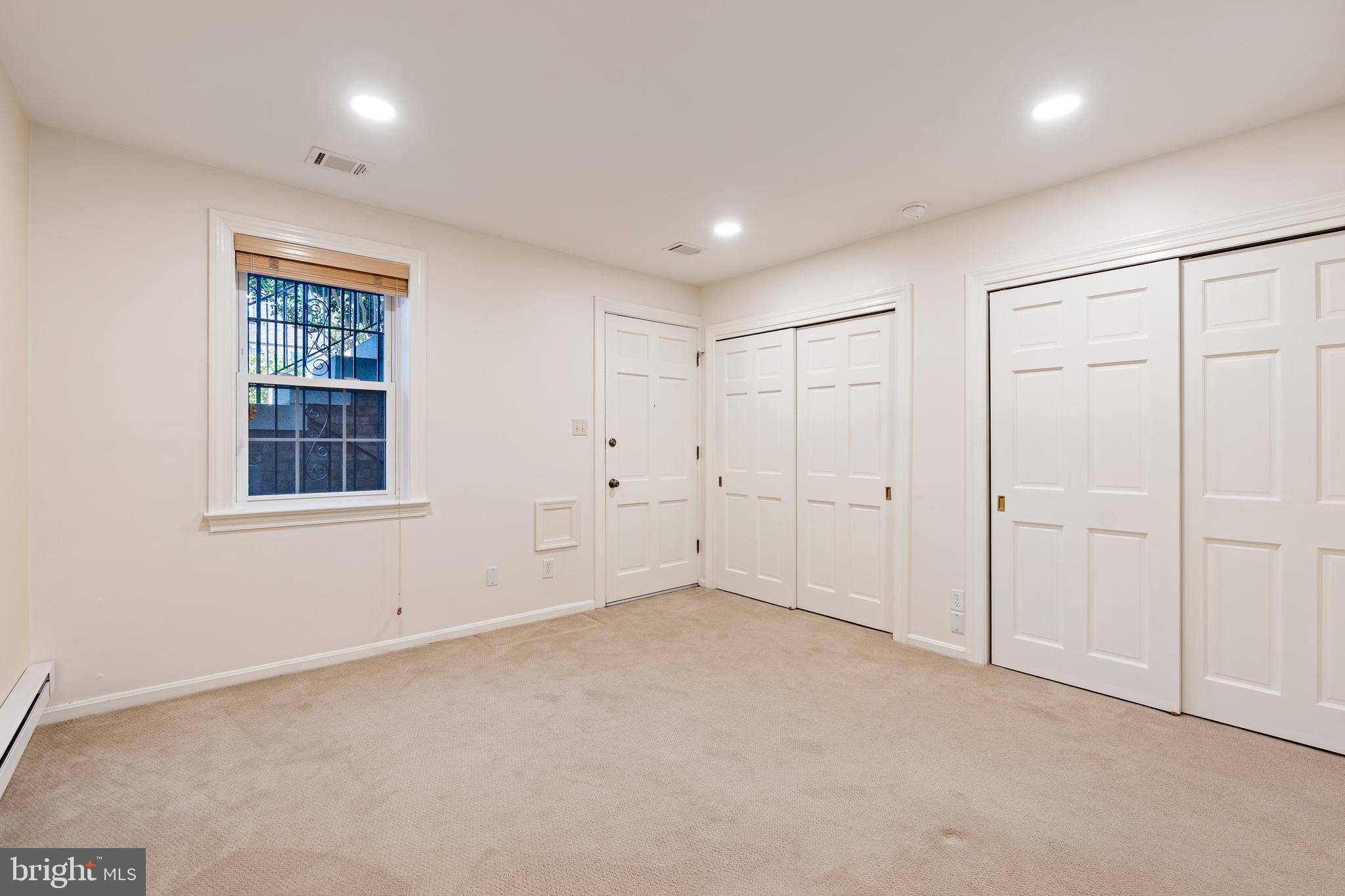 706 6th Street Southwest Washington, DC 20024 - Photo 27 of 39 a view of an empty room with a window