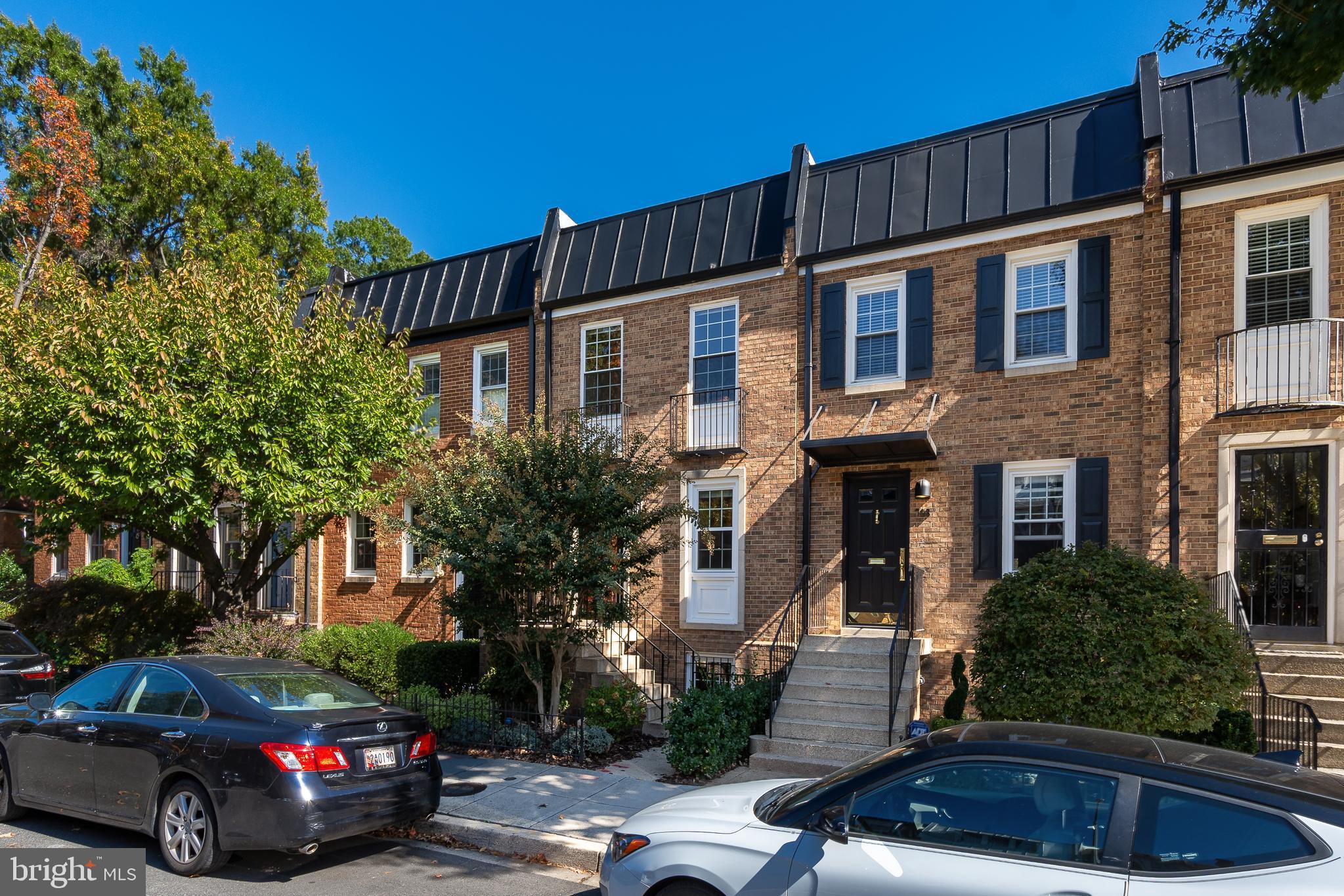 706 6th Street Southwest Washington, DC 20024 - Photo 35 of 39 a front view of a house with a garden