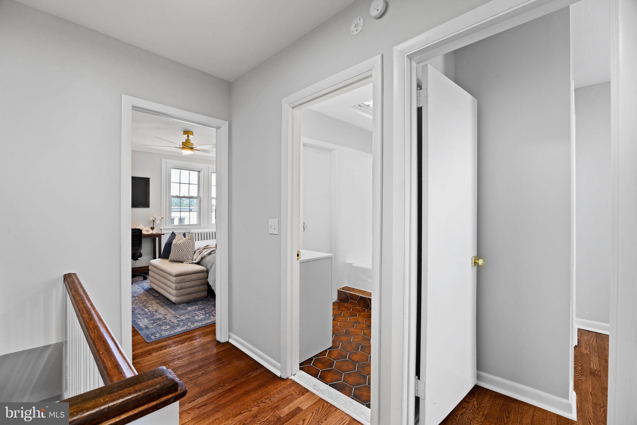 171 North Carol Boulevard Upper Darby, PA 19082 - Photo 11 of 32 a view of a hallway with bathroom and wooden floor