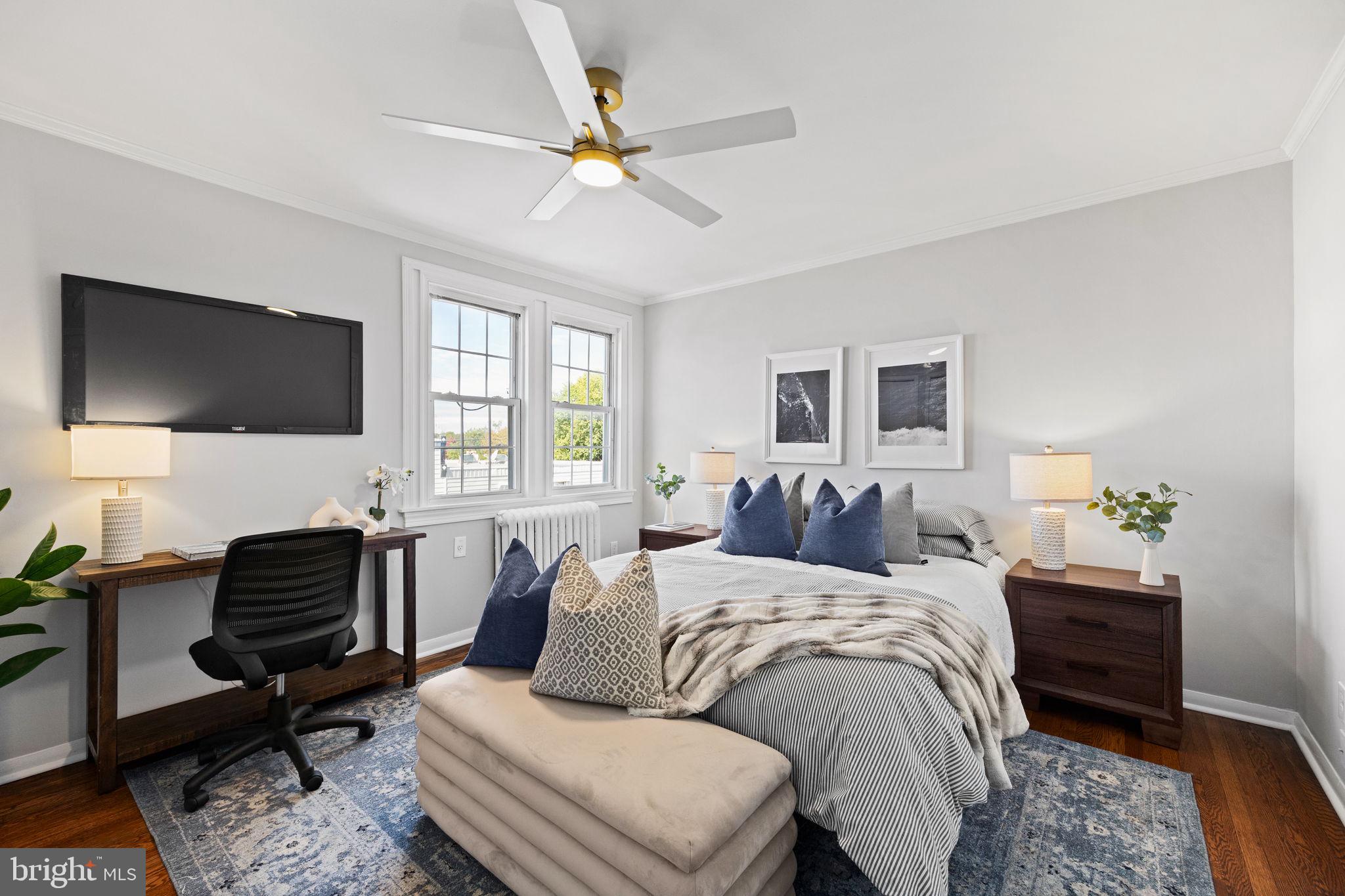 171 North Carol Boulevard Upper Darby, PA 19082 - Photo 12 of 32 a bed room with a bed window and a flat screen tv