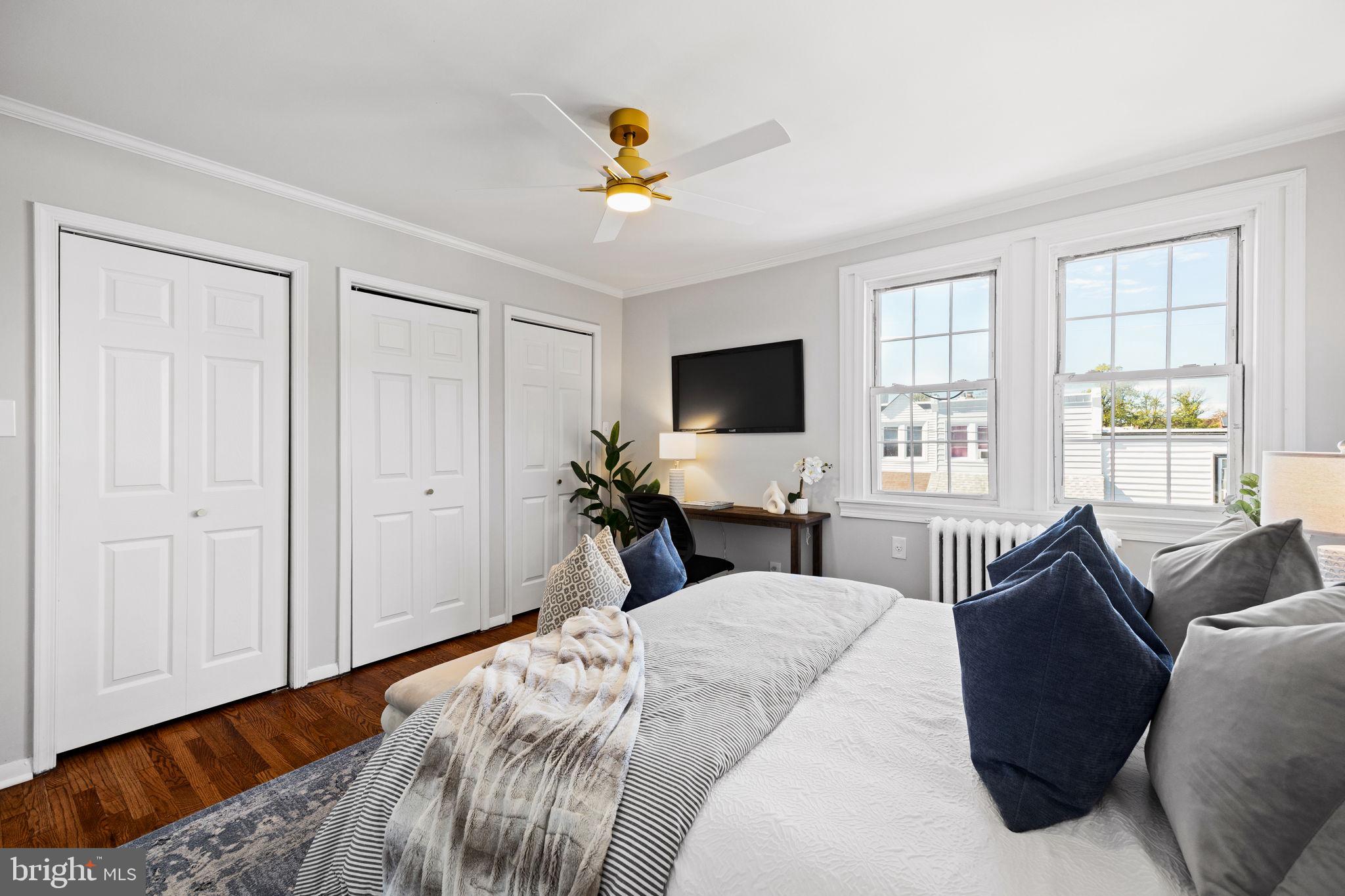 171 North Carol Boulevard Upper Darby, PA 19082 - Photo 13 of 32 a bedroom with a bed and a chandelier