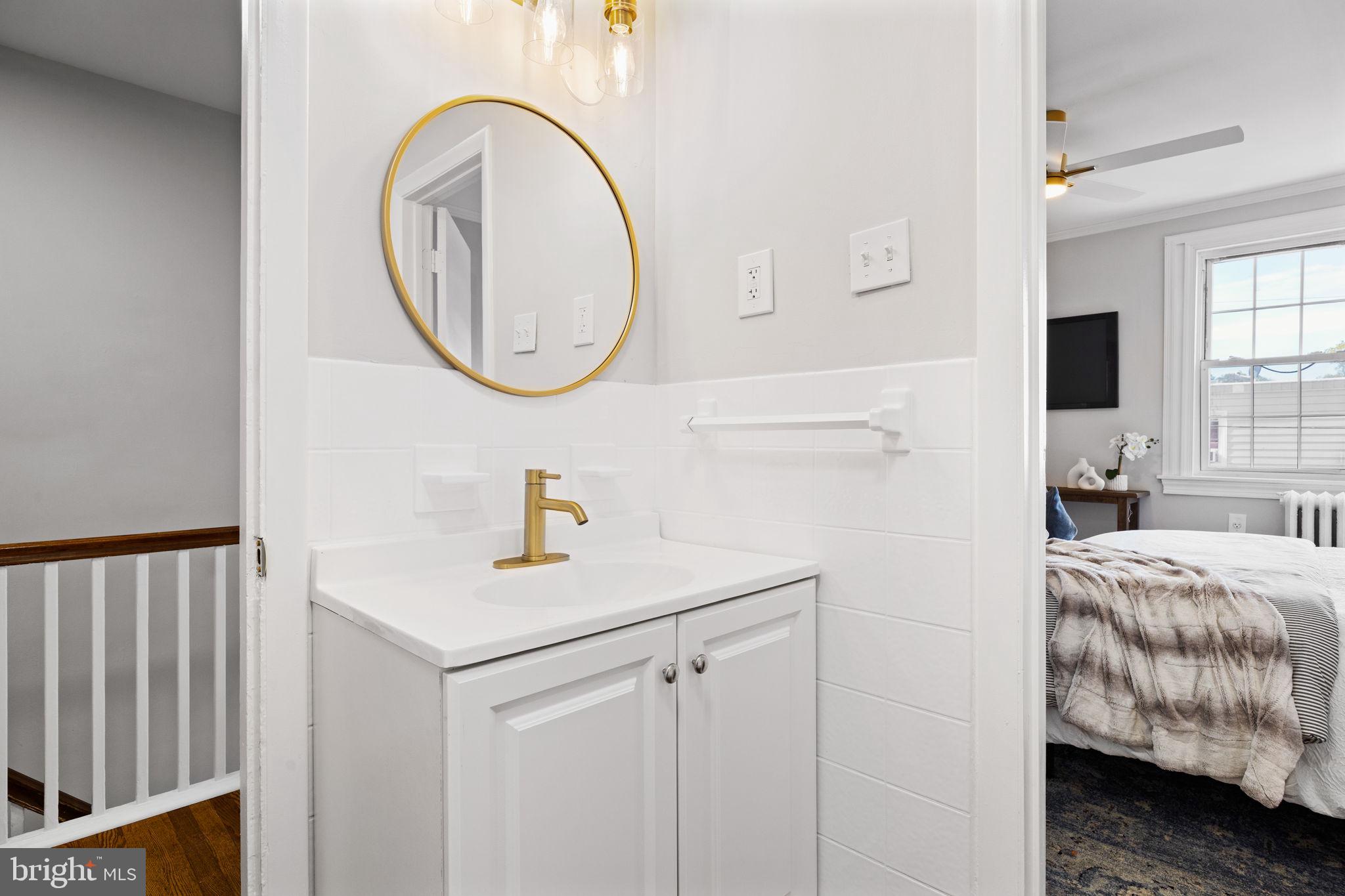 171 North Carol Boulevard Upper Darby, PA 19082 - Photo 15 of 32 a bedroom with a bed and a mirror