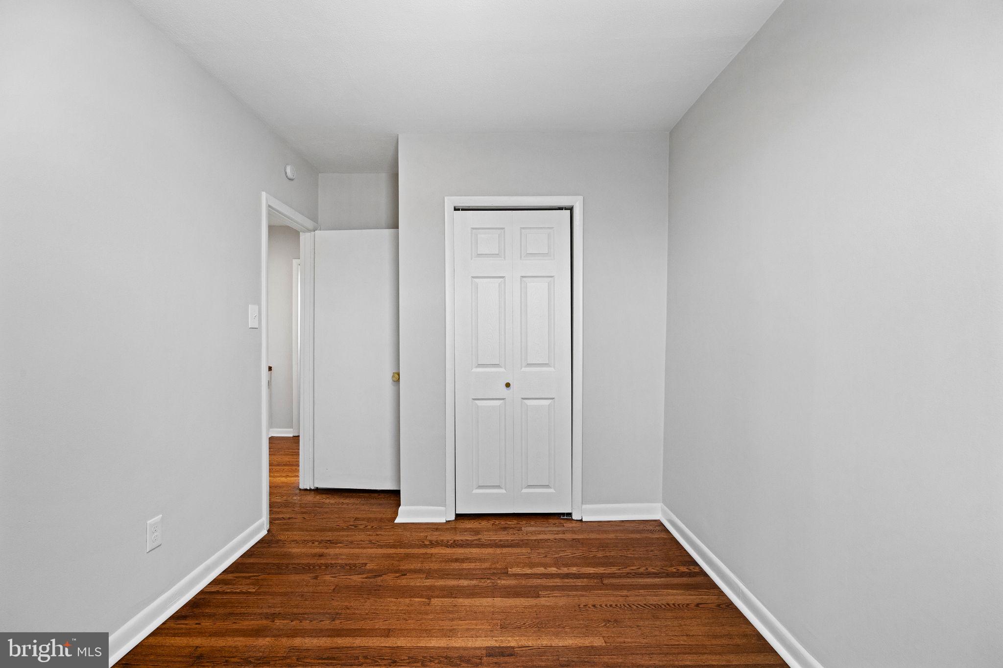 171 North Carol Boulevard Upper Darby, PA 19082 - Photo 18 of 32 a view of an empty room with wooden floor