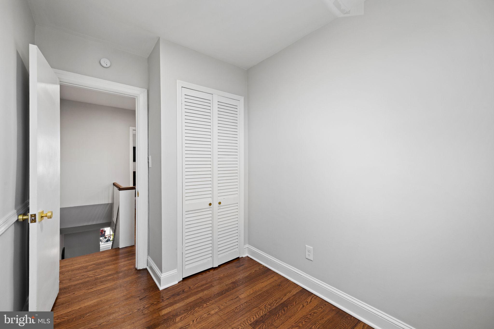 171 North Carol Boulevard Upper Darby, PA 19082 - Photo 20 of 32 an empty room with wooden floor and closet