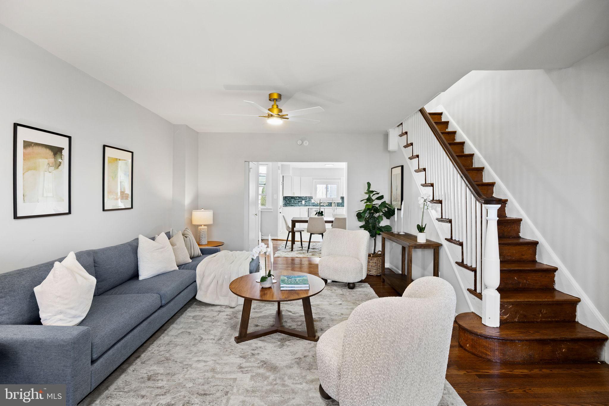 171 North Carol Boulevard Upper Darby, PA 19082 - Photo 2 of 32 a living room with furniture and wooden floor