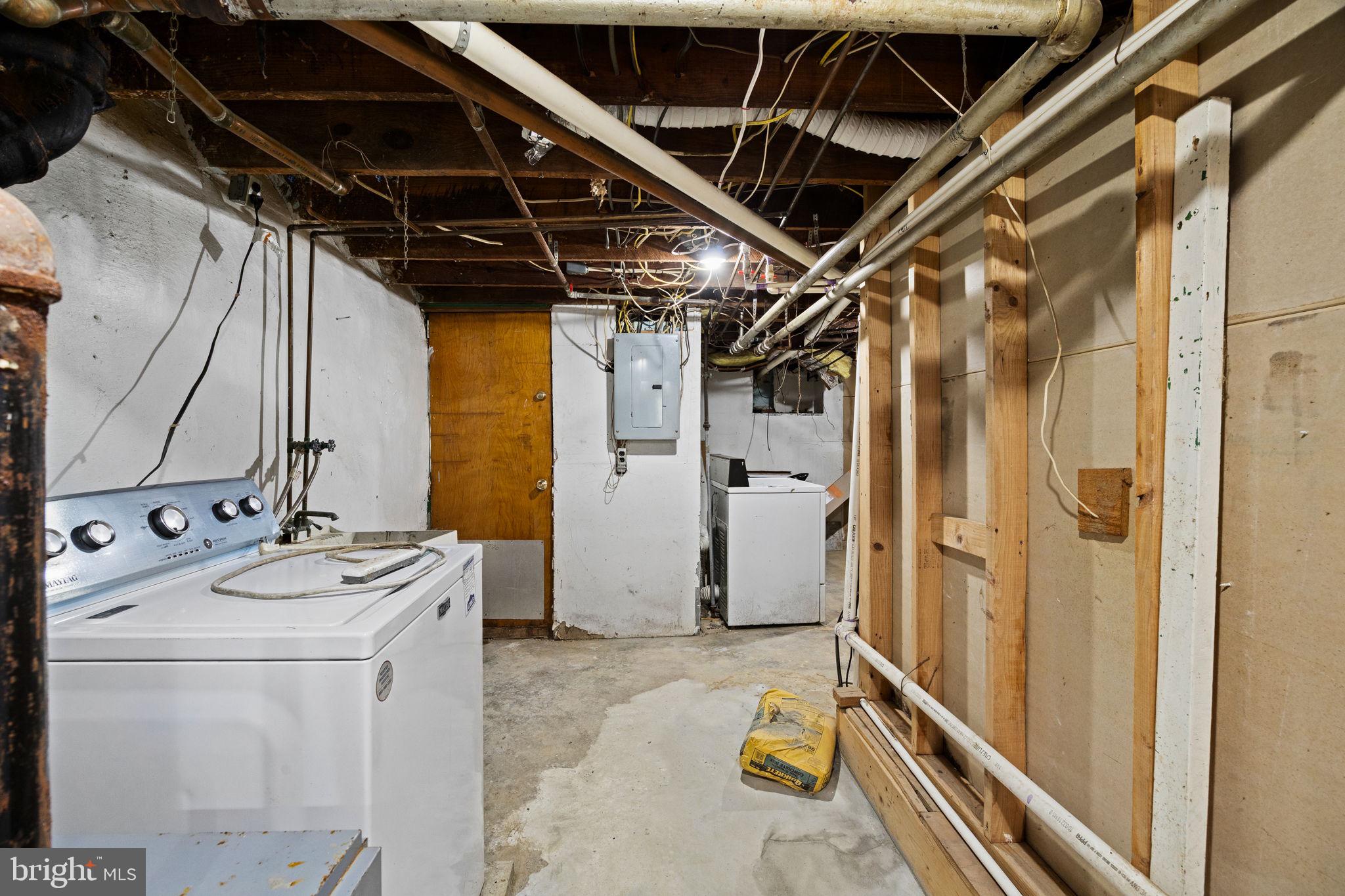 171 North Carol Boulevard Upper Darby, PA 19082 - Photo 25 of 32 a utility room with dryer and washer