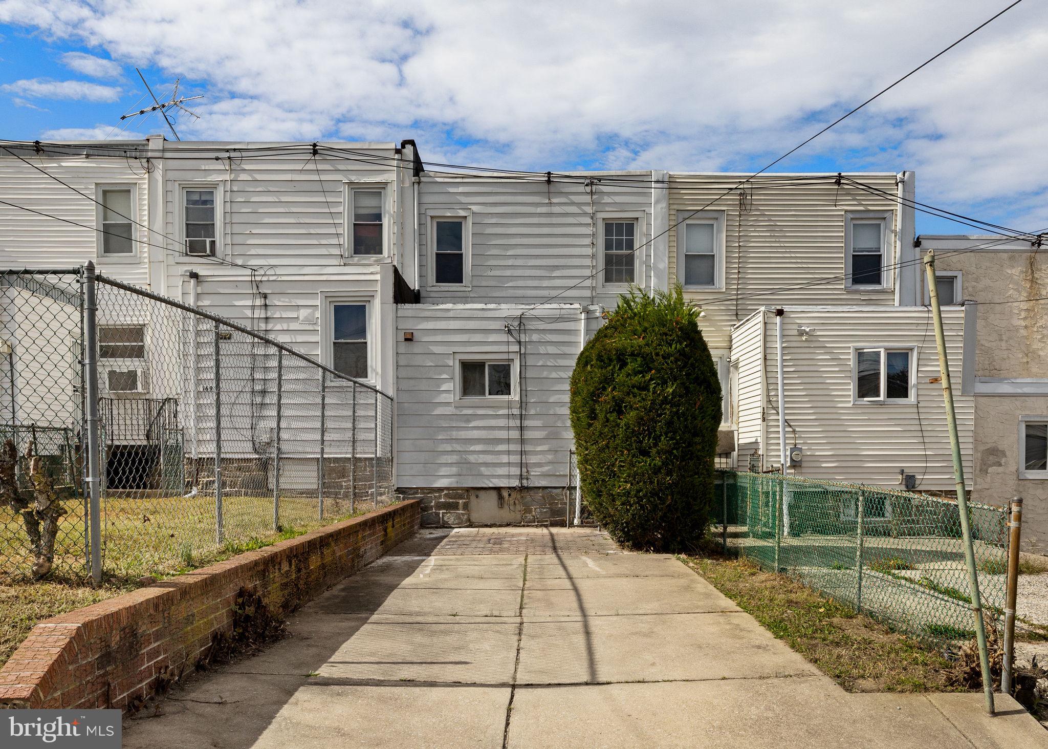 171 North Carol Boulevard Upper Darby, PA 19082 - Photo 31 of 32 a view of a brick house with large windows