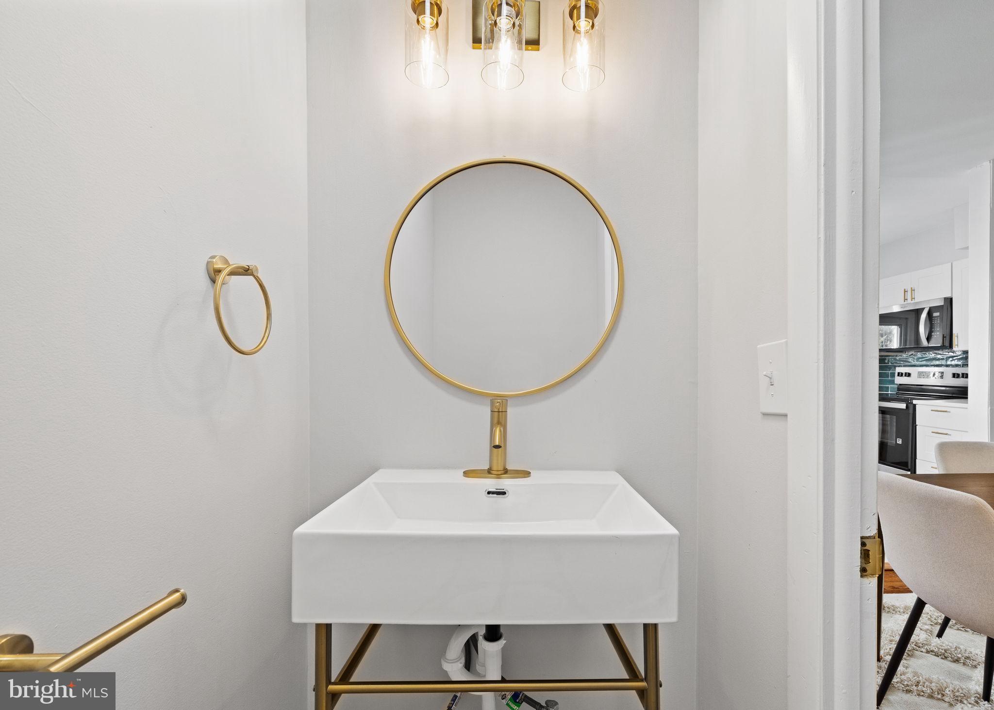 171 North Carol Boulevard Upper Darby, PA 19082 - Photo 9 of 32 a bathroom with a sink and a mirror