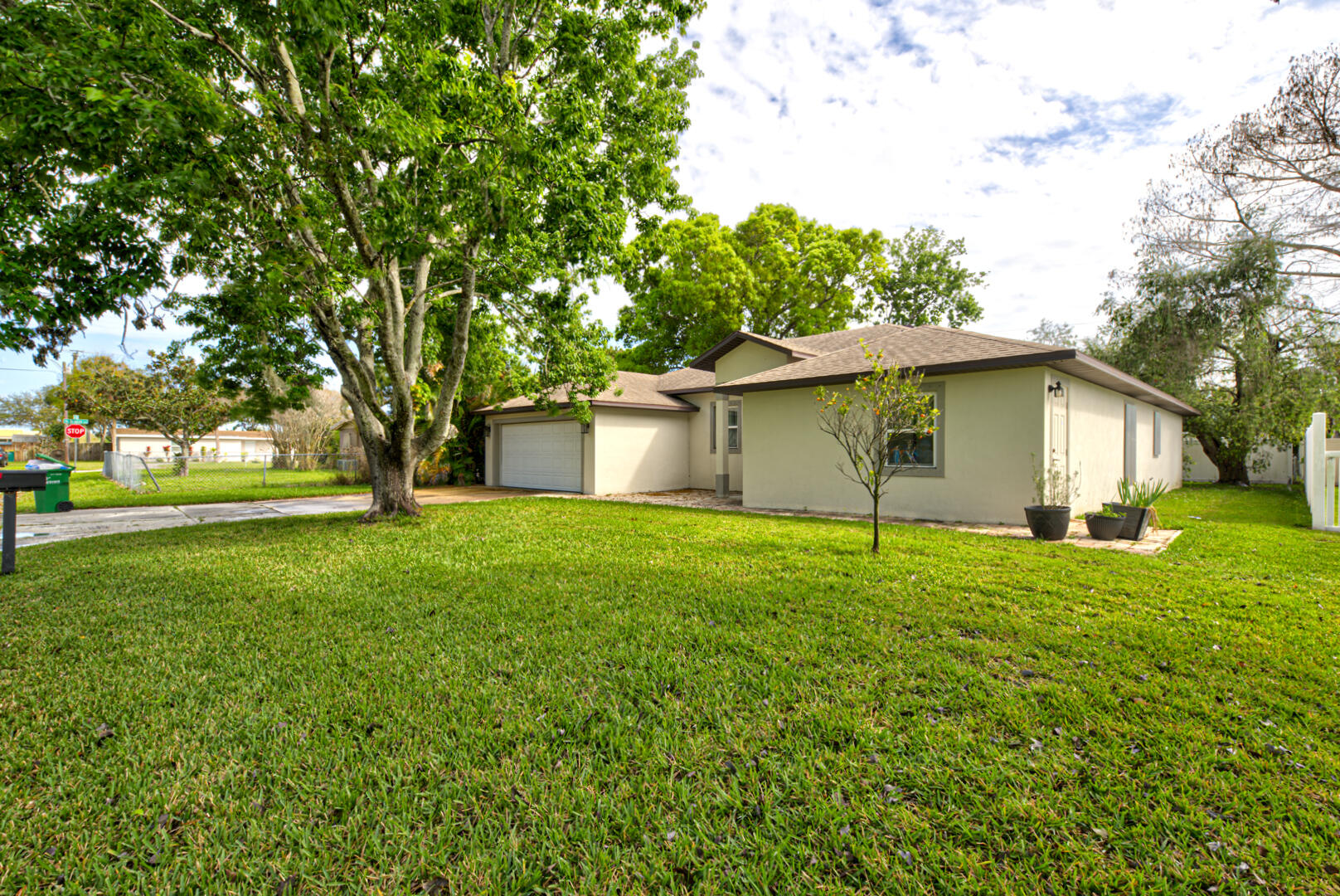 2779 Tropic Road Melbourne, FL 32935 - Photo 6 of 45 a view of a house with backyard and garden