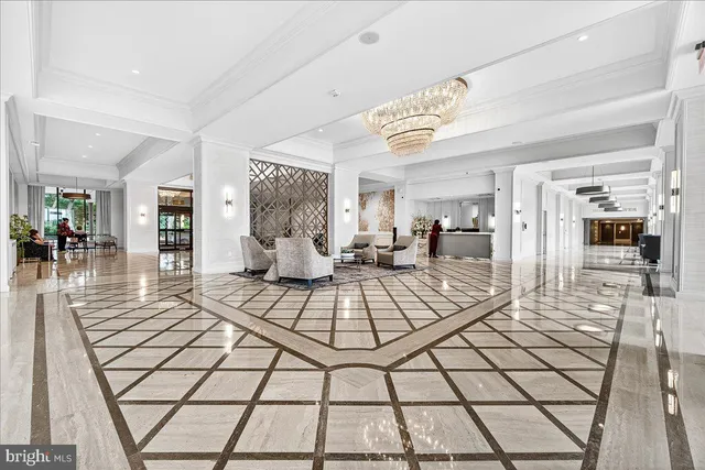 a view of a livingroom with furniture and windows