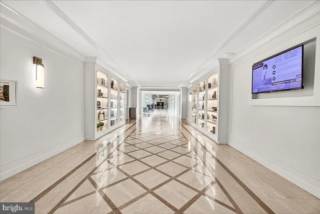 a view of a hallway with windows