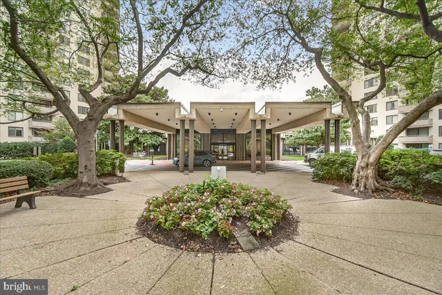 a view of a street with houses on both side