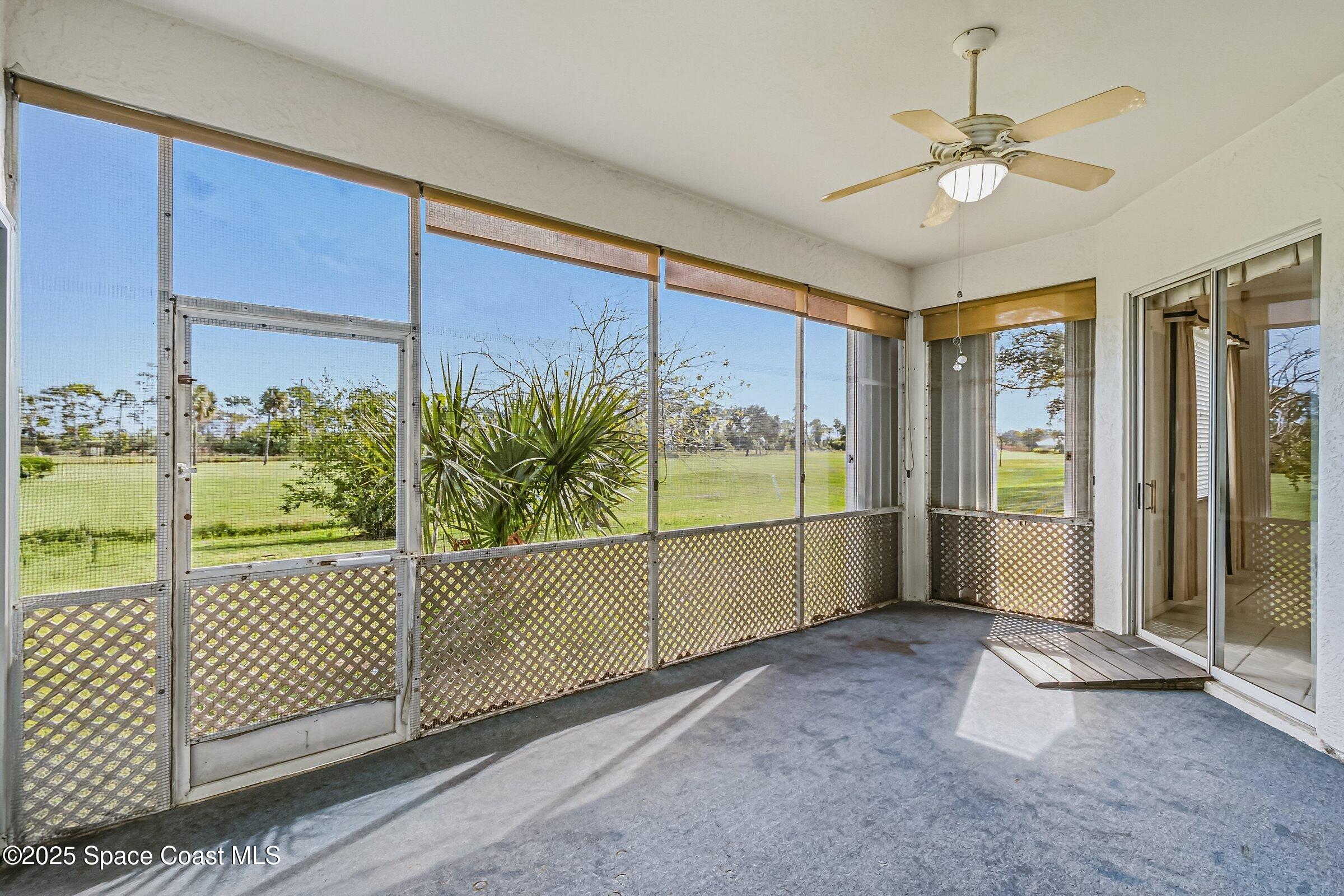 4048 Sand Ridge Drive Merritt Island, FL 32953 - Photo 36 of 61 Screened Patio overlooks golf course