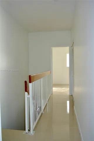 a bathroom with a toilet sink and shower
