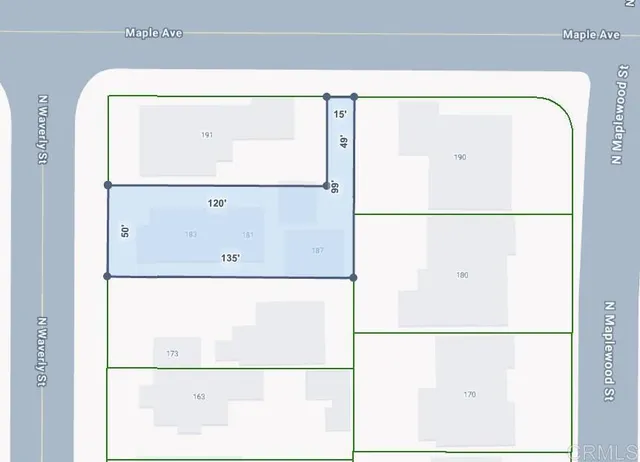 a kitchen with appliances a sink and cabinets