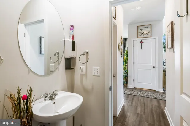 a kitchen with granite countertop kitchen island stainless steel appliances a sink and a center island