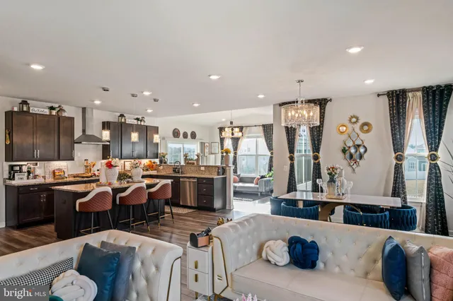 a kitchen with sink and refrigerator