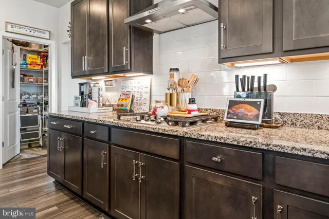 a bathroom with a sink double vanity and a shower