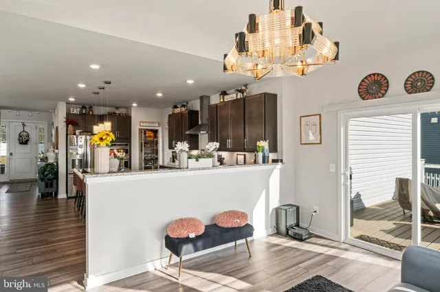 a en suite bathroom with a sink double vanity and a tub