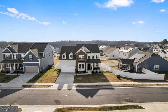 a front view of a house with entryway and front door