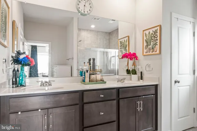 front view of a house with a fence