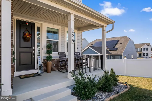 a view of a workspace with furniture and rug