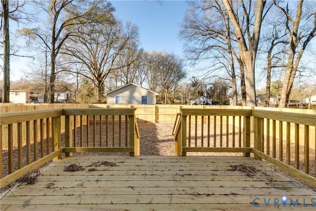 a view of entrance gate with trees