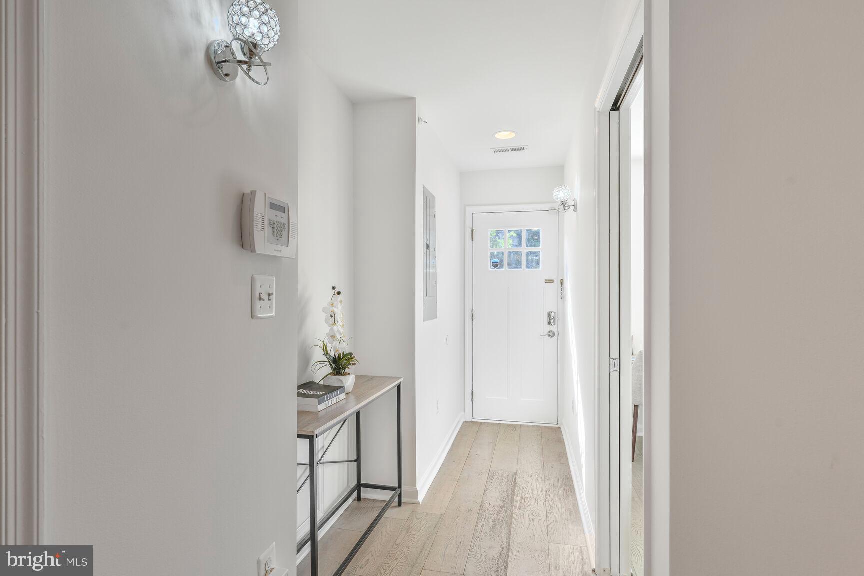1268 16th Street Northeast Washington, DC 20002 - Photo 2 of 17 a view of a hallway with chandelier