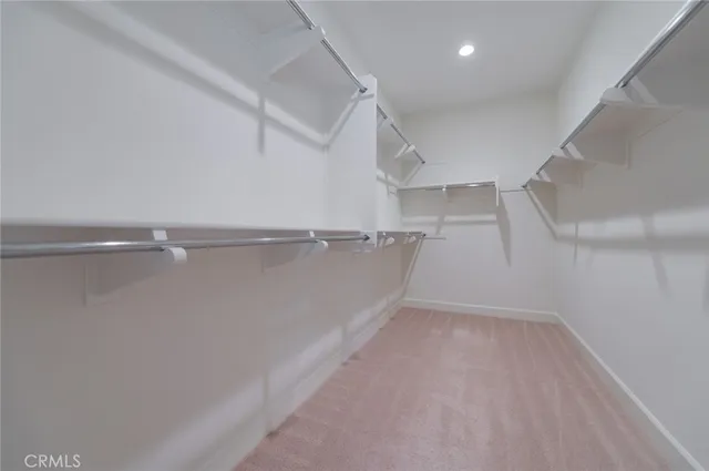 front view of a house with potted plants