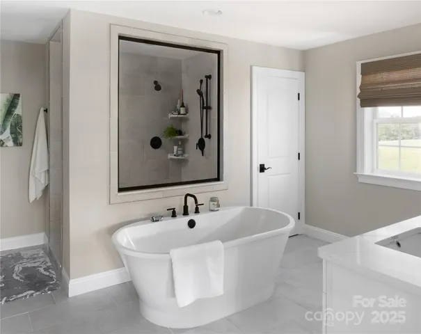 a white bath tub sitting in a bathroom