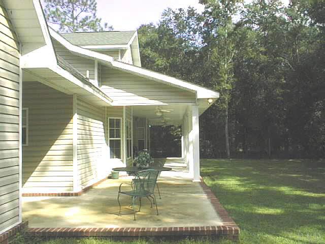 5965 Clark Road Milton, FL 32570 - Photo 16 of 16 a view of outdoor space yard deck patio and slide
